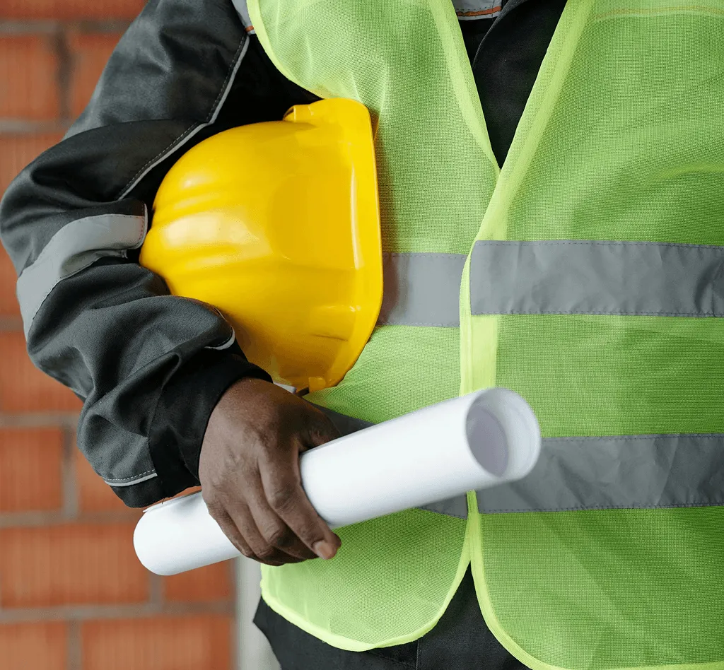 Heritage renovation contractor with building plans